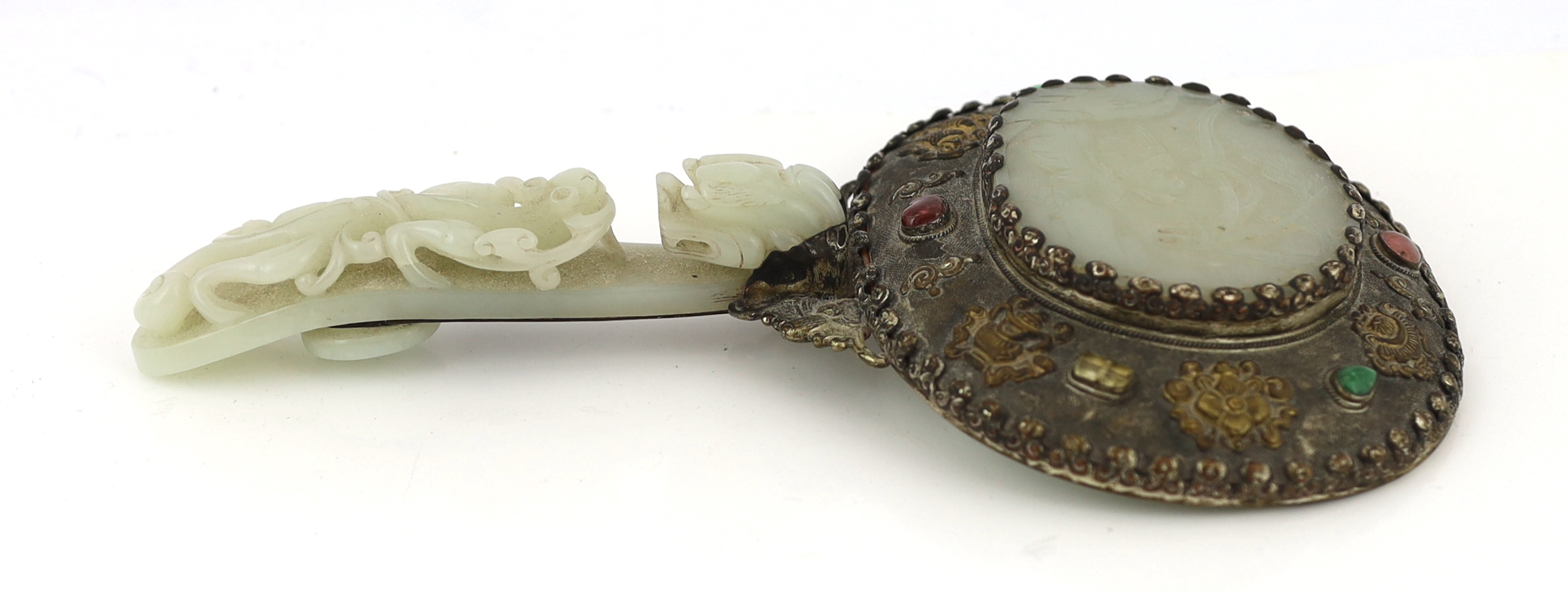 A Chinese celadon jade mounted hand mirror, the jade 18th/19th century